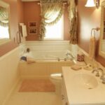Modern shower remodel with matte black fixtures and gray tiles in Columbus.