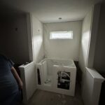 Barrier-free walk-in shower with wide entry for wheelchair accessibility in Columbus.