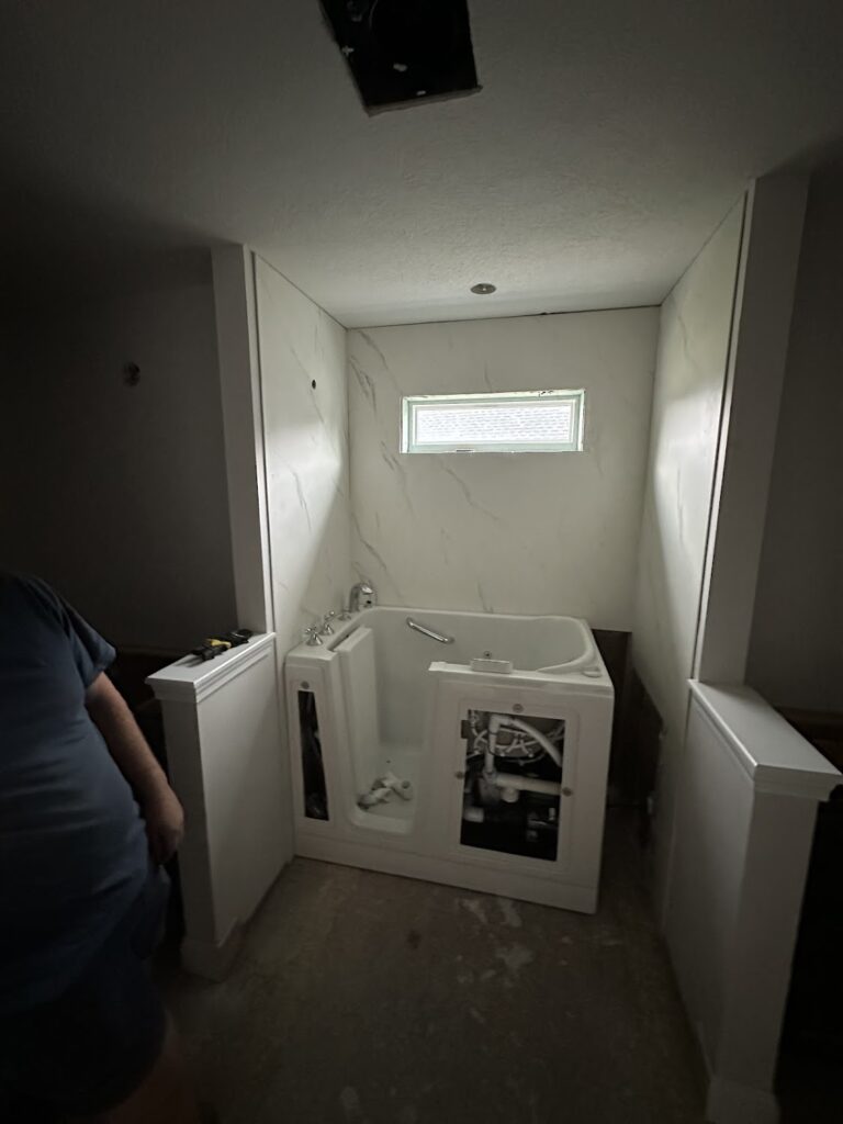 Barrier-free walk-in shower with wide entry for wheelchair accessibility in Columbus.