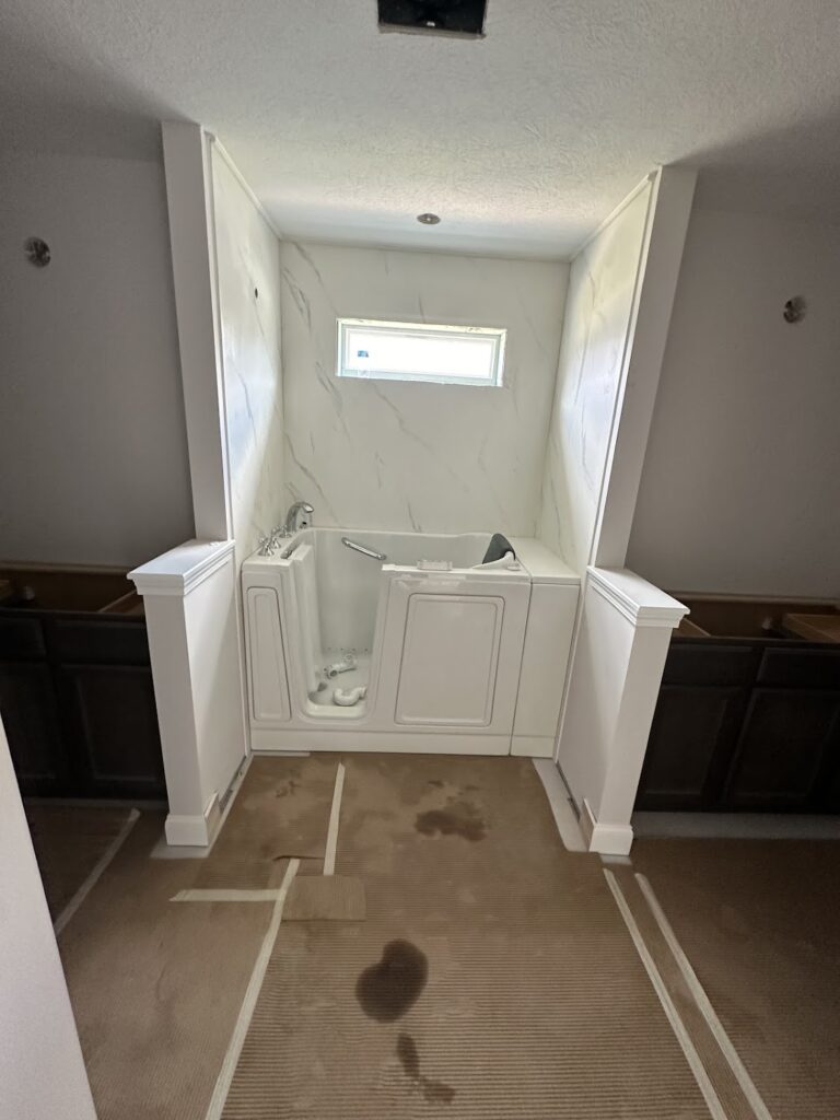 Custom tiled shower bench and safety grab bar installation in Dublin, OH.