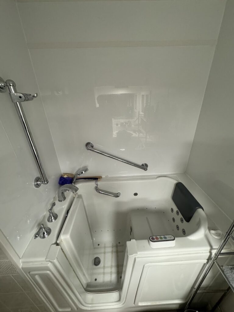 Modern LED vanity lighting and custom mirror installation in Powell, Ohio.