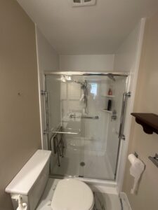 Frosted glass shower door installation for added privacy in a Dublin bathroom remodel.