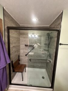 High-polish chrome shower fixtures and adjustable shower head in Powell, Ohio.