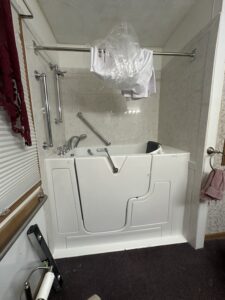 Close-up of walk-in tub hydrotherapy jets and easy-reach controls in Dublin, OH.