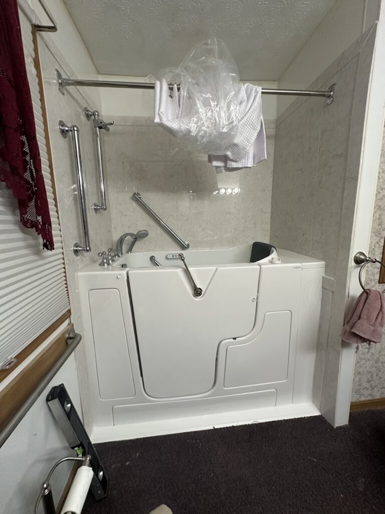 Close-up of walk-in tub hydrotherapy jets and easy-reach controls in Dublin, OH.