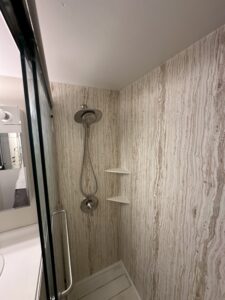 Adjustable handheld shower wand installation for versatile use in Powell.