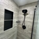 Fully remodeled bathroom with new vanity, toilet, and shower in Powell.