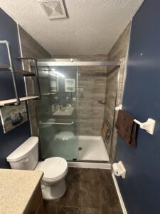 Brushed nickel high-pressure shower head installation in Columbus, OH.