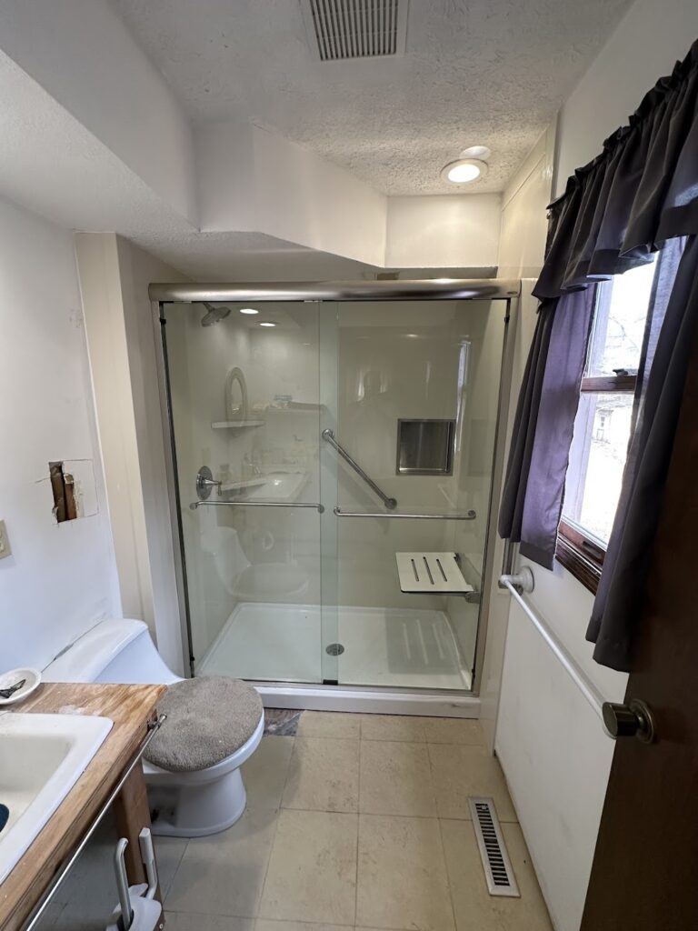 Blacklick 15 Full bathroom renovation reveal with new flooring and walk-in accessibility in Powell.