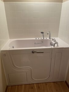 Heavy-duty safety grab bars installed on a walk-in tub in Powell, Ohio.