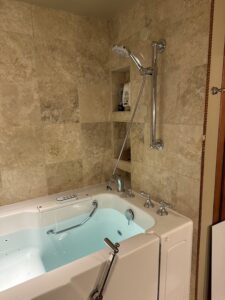 Chrome ceiling-mounted rain shower head installation in Columbus, OH.