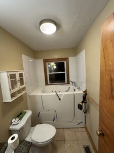 Slip-resistant pebble tile shower floor installation in Dublin, OH.