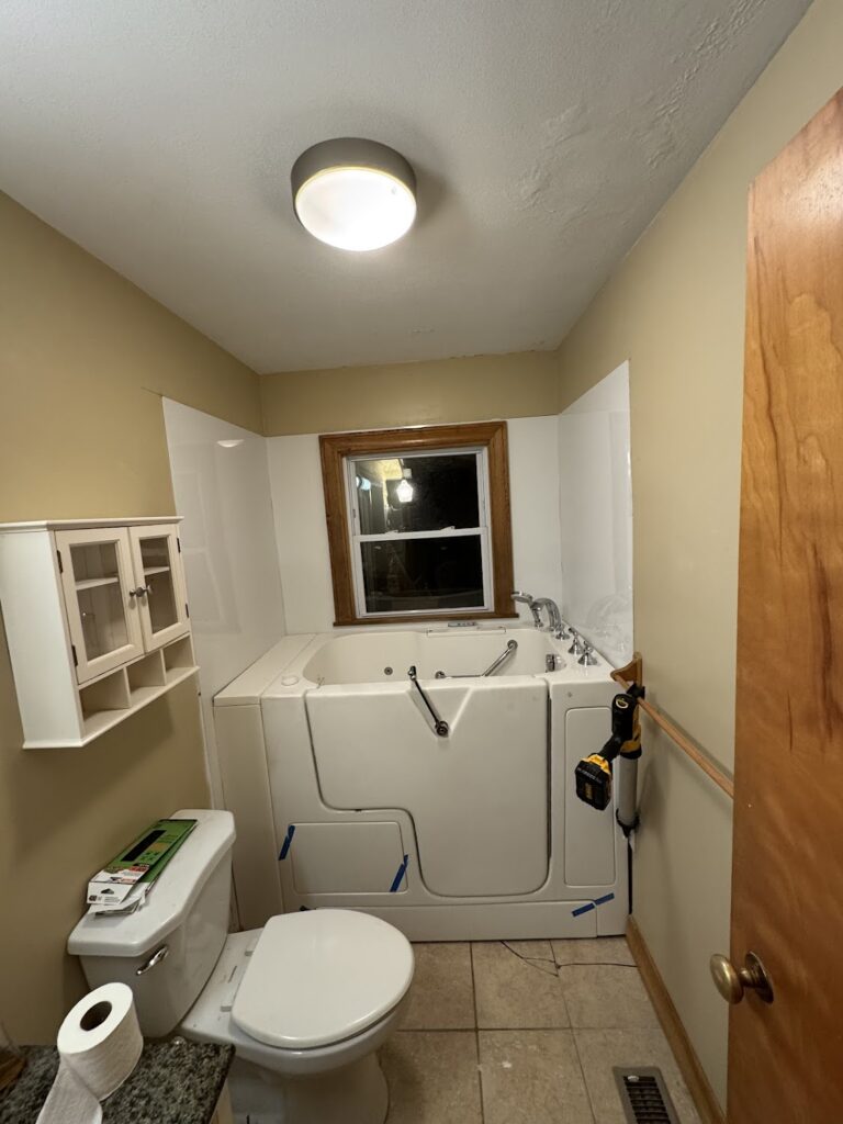 Slip-resistant pebble tile shower floor installation in Dublin, OH.