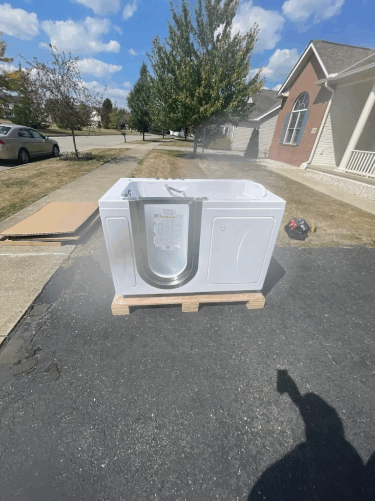 Accessible tub-to-shower conversion with safety grab bars in Powell, Ohio.