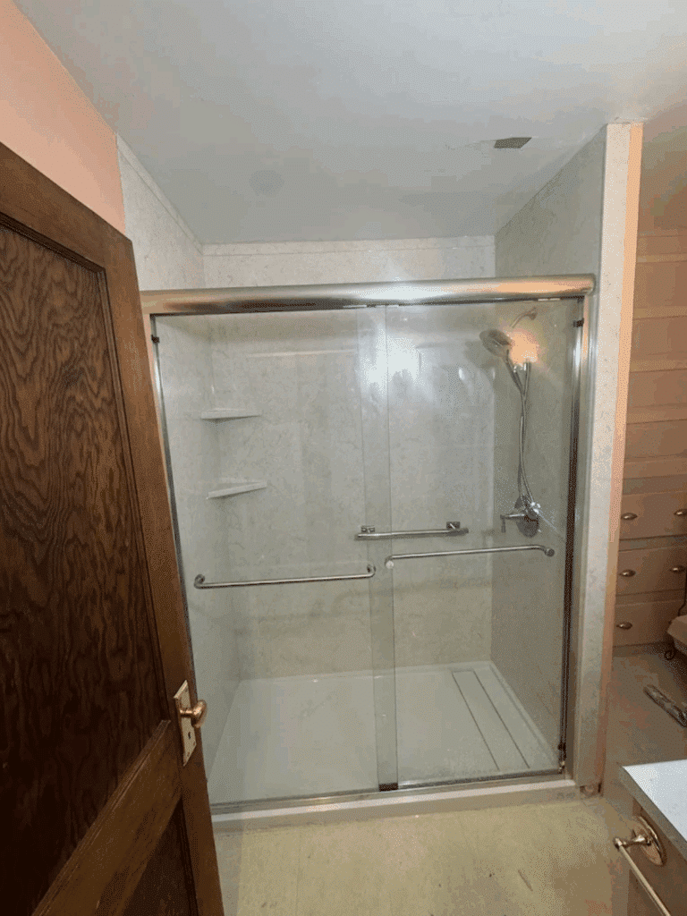 Custom gray stone tile walk-in shower installation in Columbus, OH.