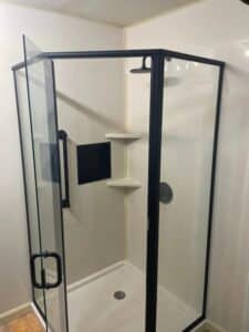Semi-frameless sliding glass shower door with smooth-glide rollers in Dublin, OH.