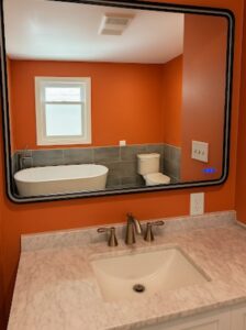 Low-threshold walk-in shower with built-in safety seat in Columbus, OH.