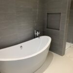 The “No-Surprise” Bathroom Remodel: Why We Now Cover Subfloor & Wall Repairs for Free