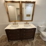 Local bathroom remodel contractor installing modern tile and fixtures in a 2000s-era Columbus home
